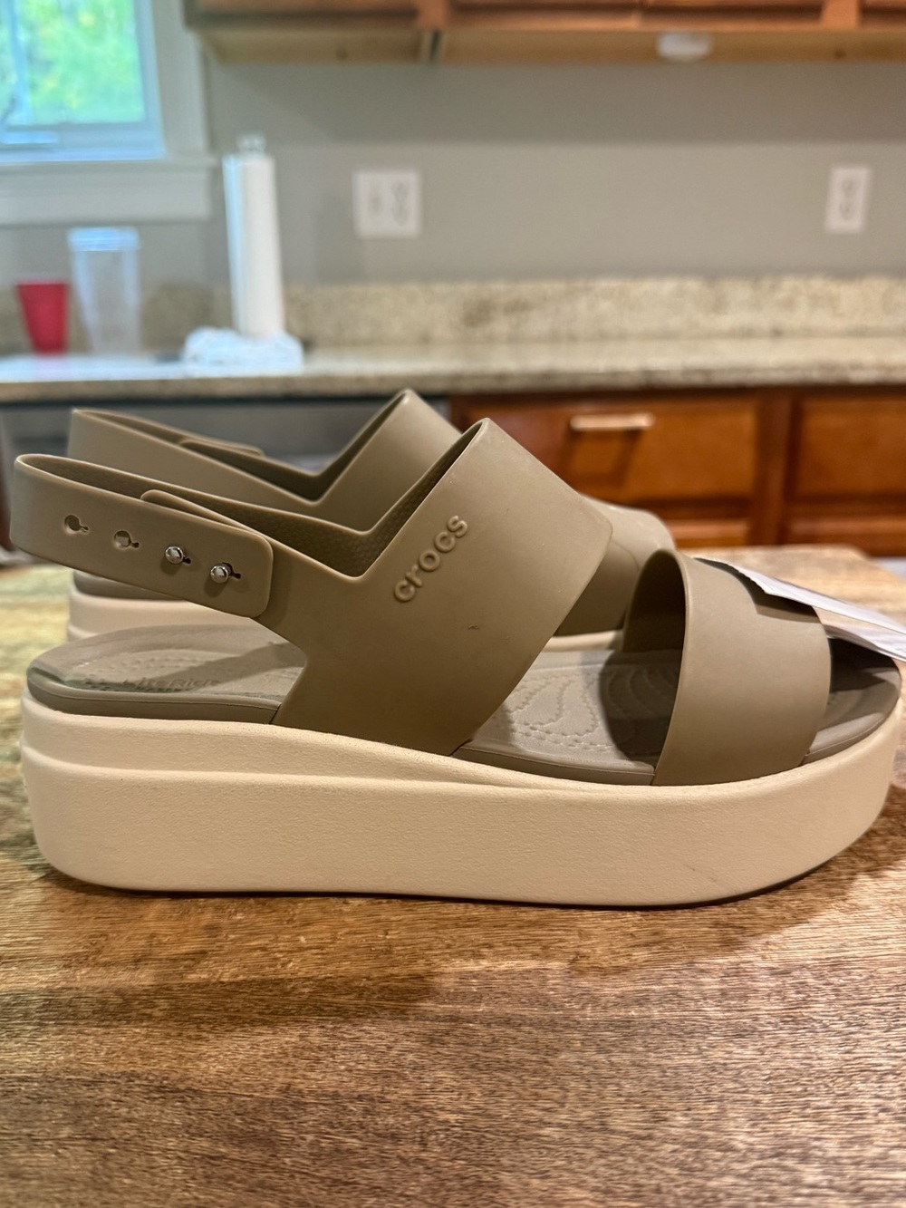 CROCS Brooklyn Low Wedge Kids Sandals in Taupe